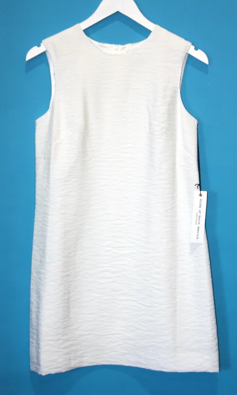 SS132 - 6 - Flutter Dress - White sold by Birds of North America