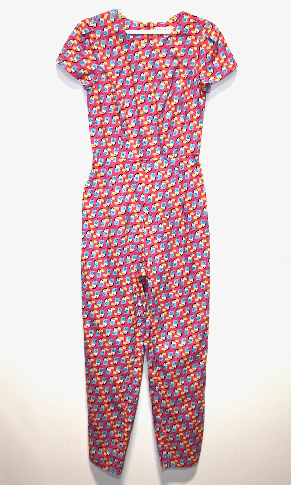 RN1000 - 4 - Gyrfalcon Jumpsuit - Toucans sold by Birds of North America