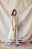 Flared Midi Skirt - Oat sold by Devlyn van Loon