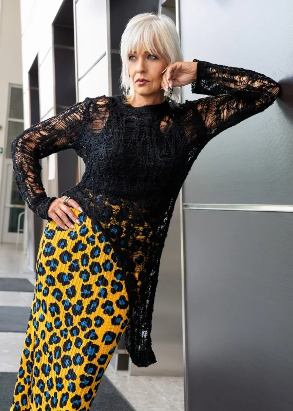 Distressed Asymmetric Hem Sweater sold by Kate Hewko