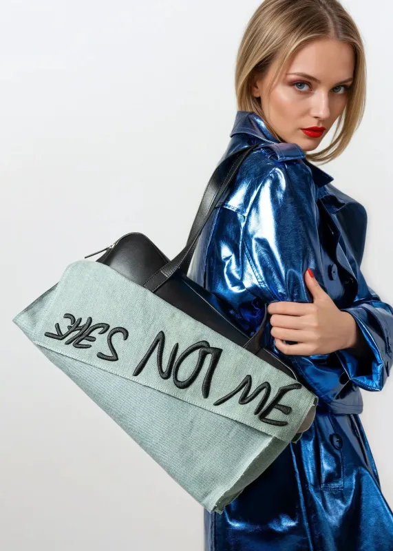 She's Not Me Denim Leather Bag sold by Kate Hewko