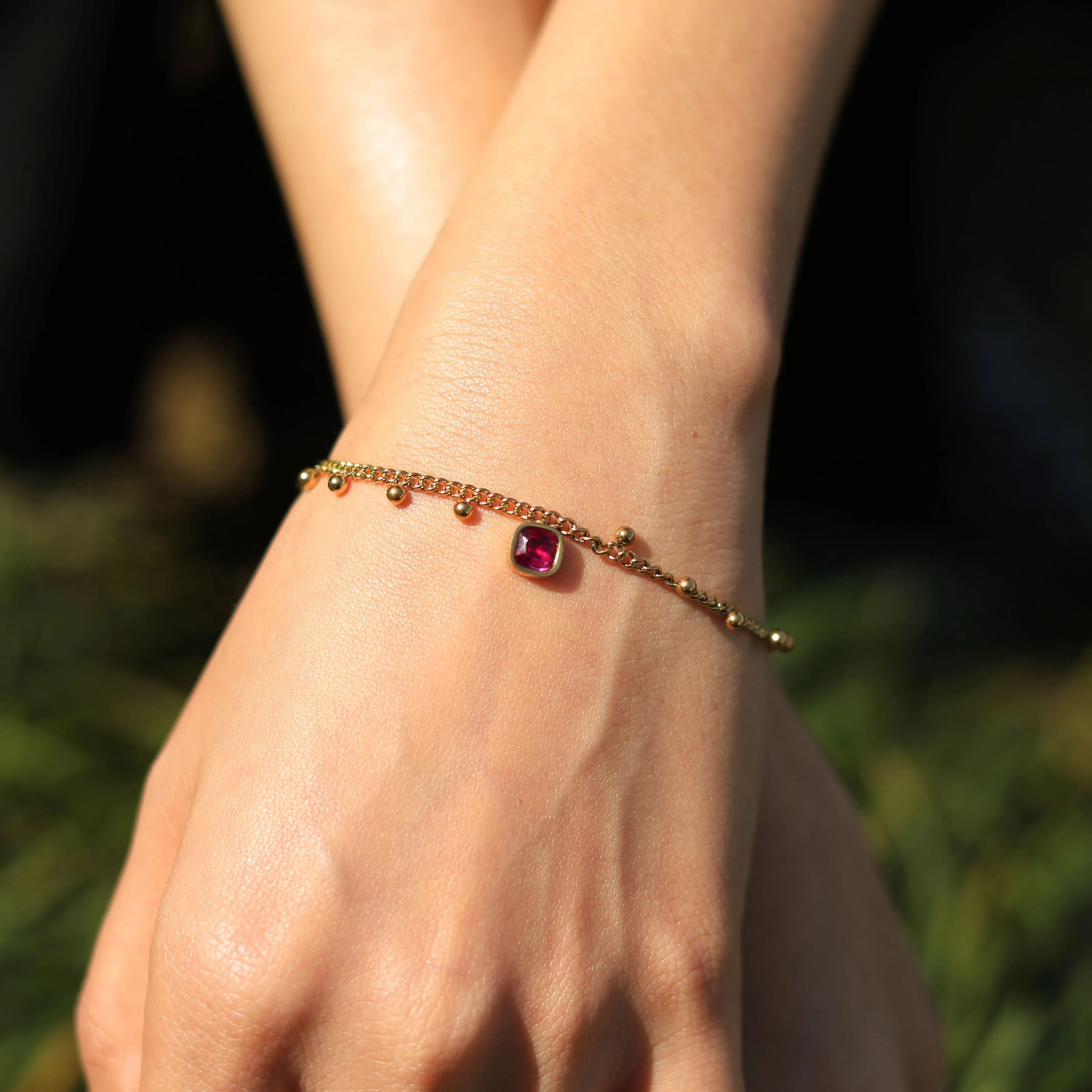 ROWEN Beaded Chain Bracelet with a Red Crystal Charm sold by Lav & Kush