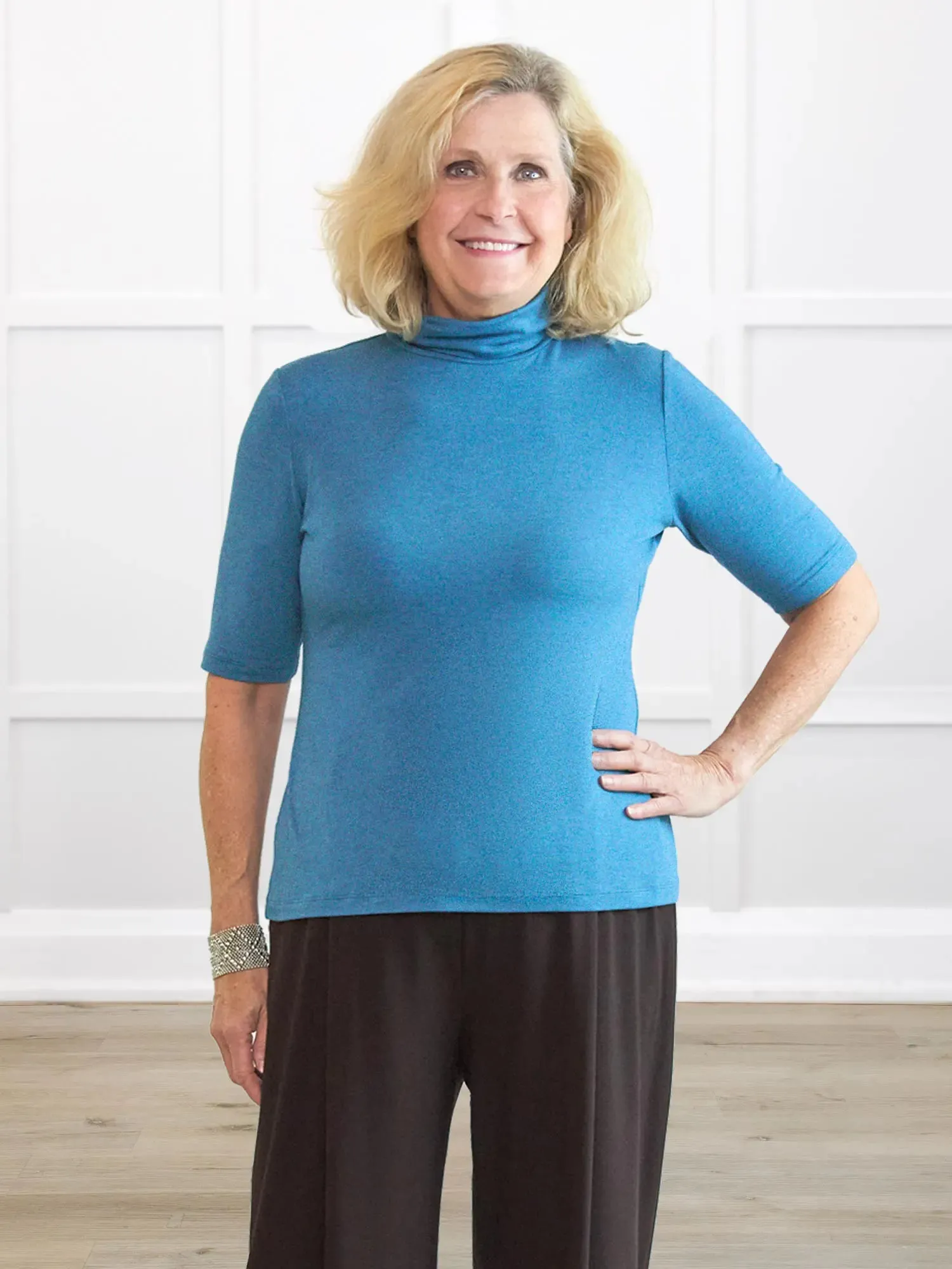 Halima half sleeve turtleneck top sold by Miik