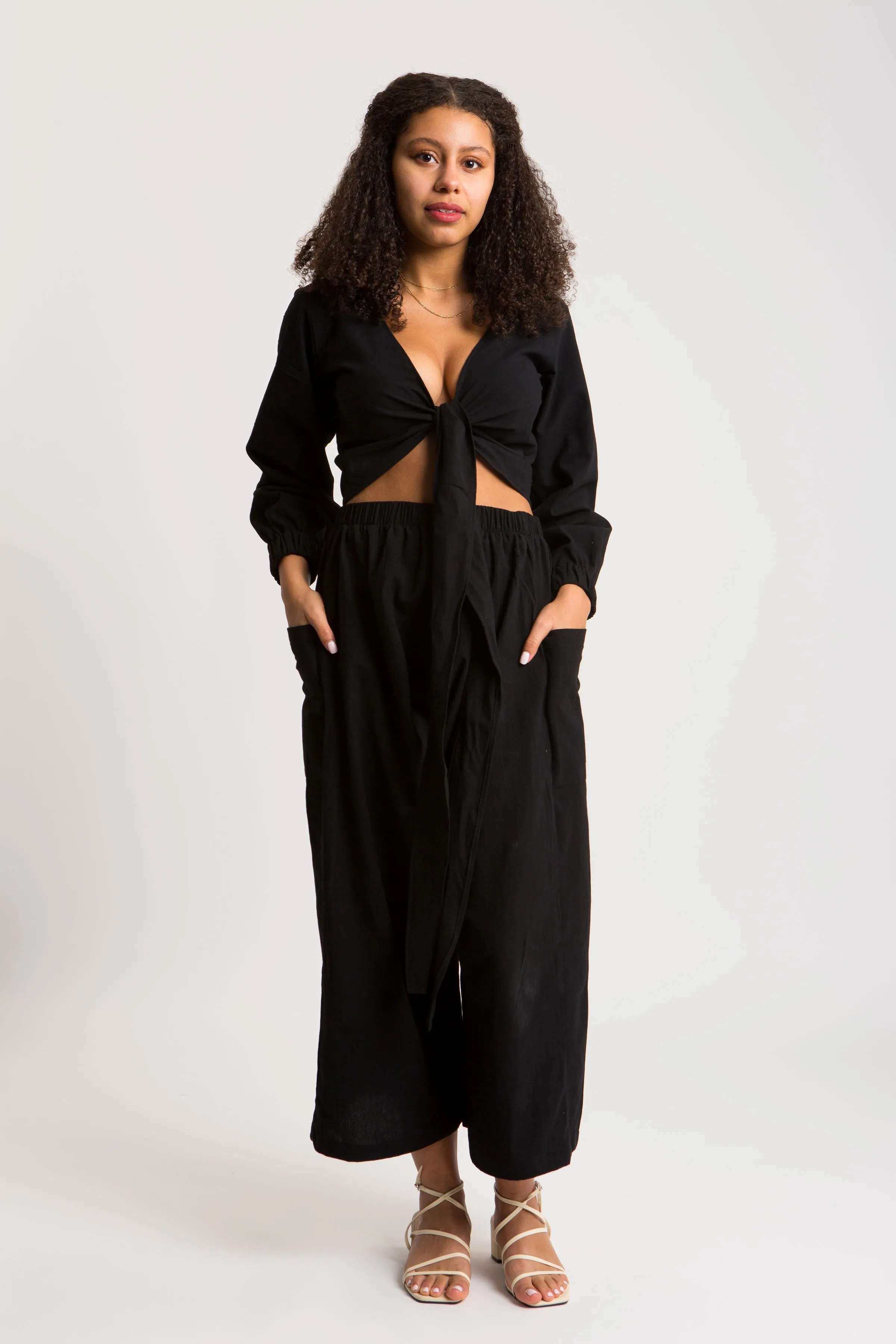 Black Harmony Wrap Top sold by Oge Ajibe