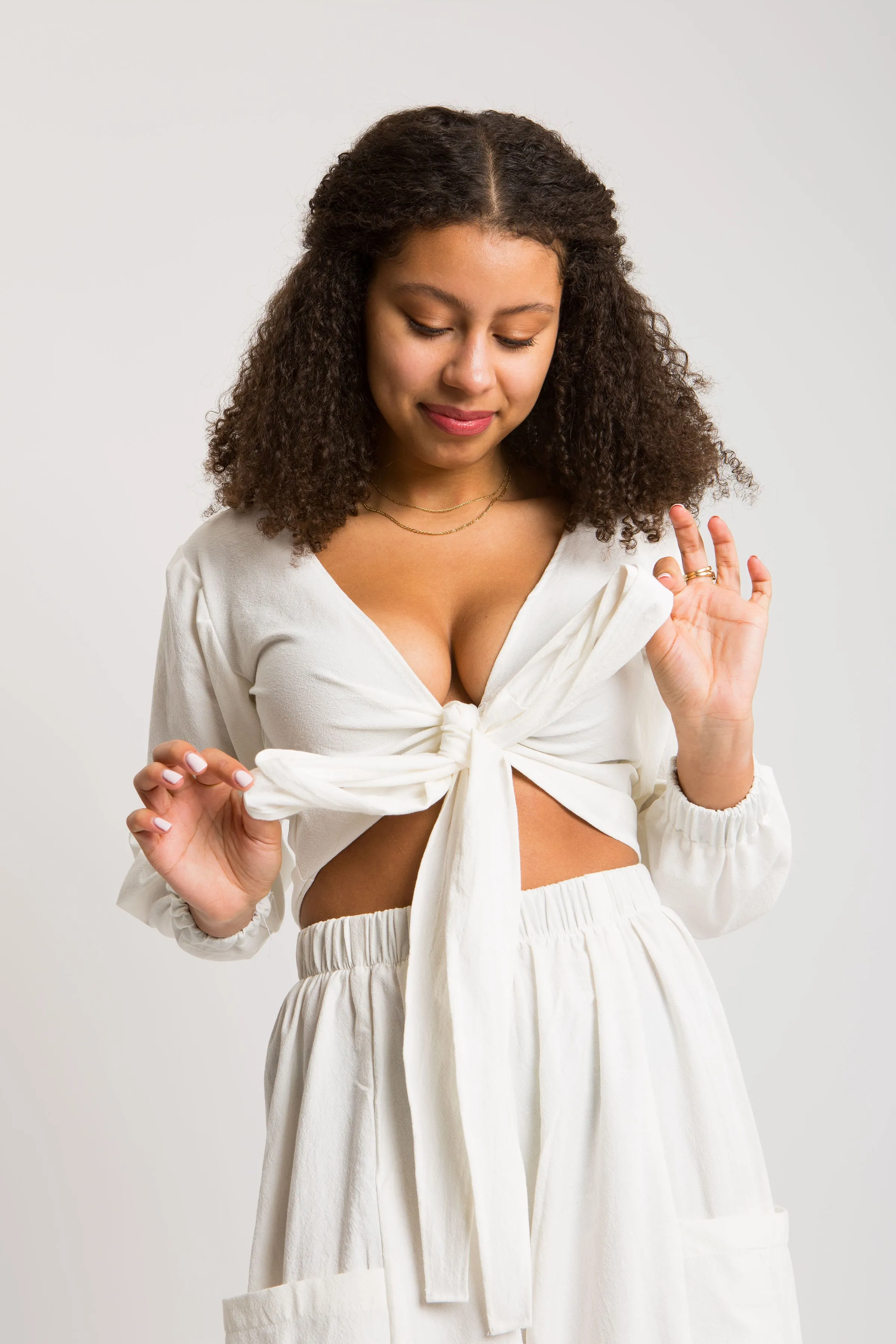 Snowy Harmony Wrap Top sold by Oge Ajibe