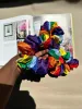 Rainbow Scrunchies sold by Oge Ajibe