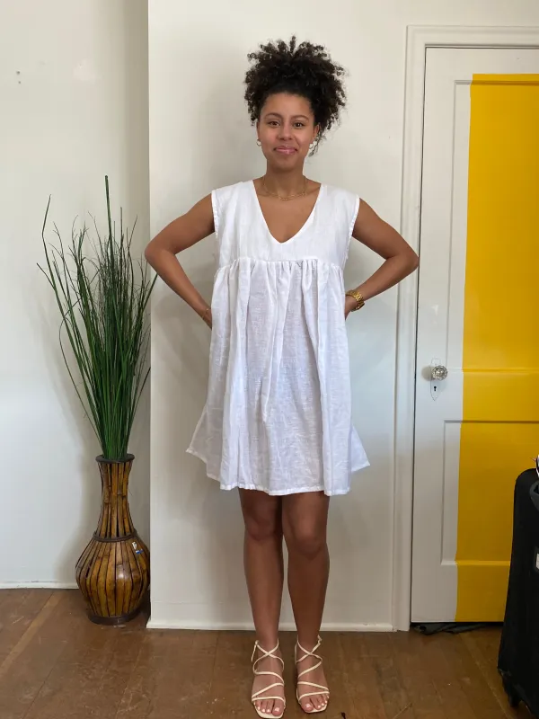 White Frolic Dress (L) sold by Oge Ajibe