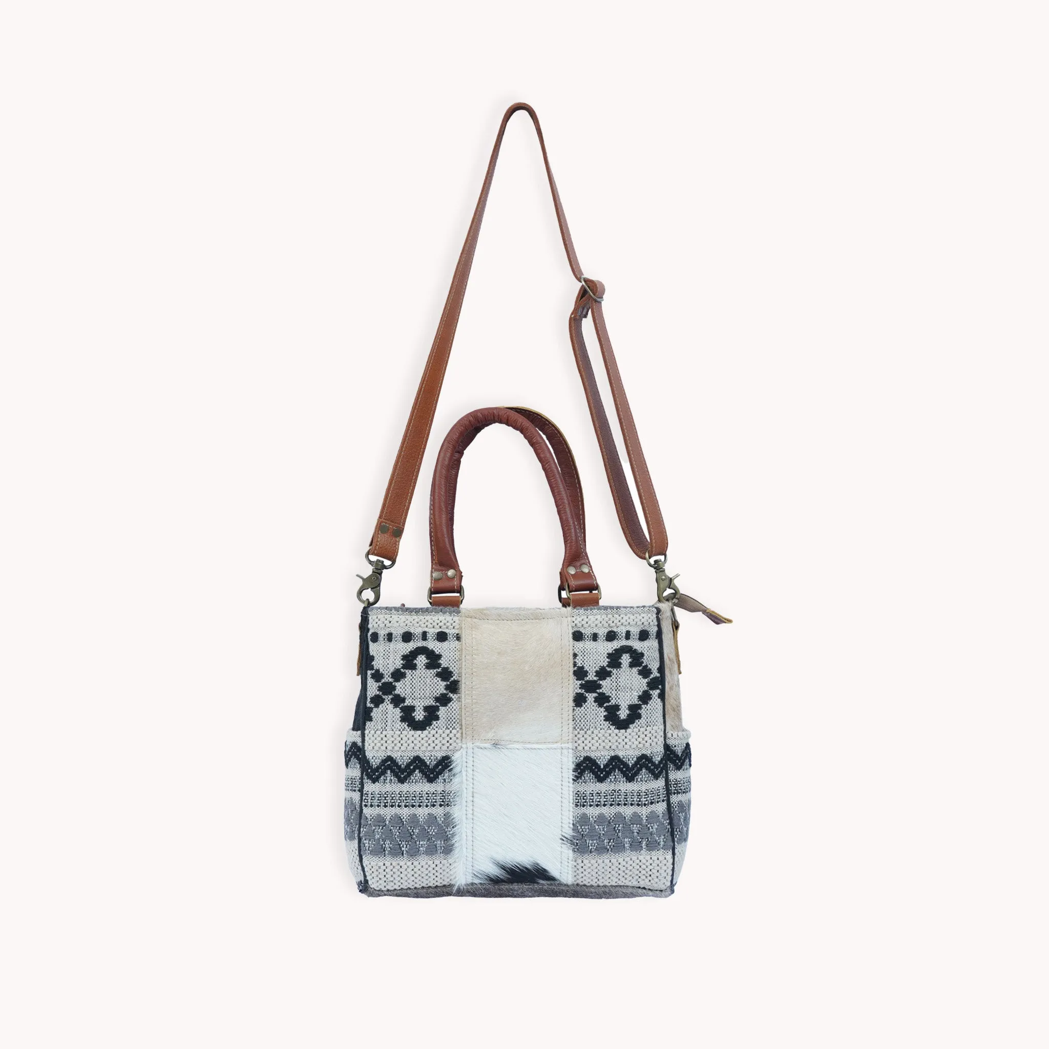 Zoe Leather & Hairon sold by POKOLOKO