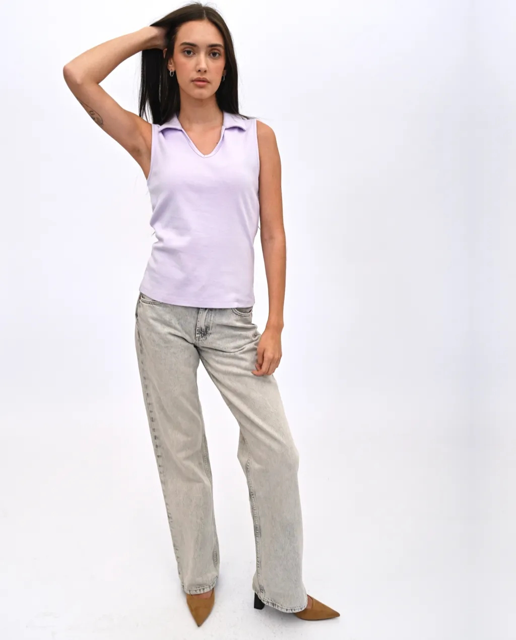 Sita sleeveless polo Top sold by preloved