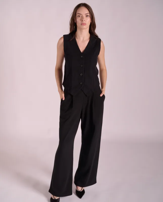 Basma pleated wide-leg pants sold by preloved