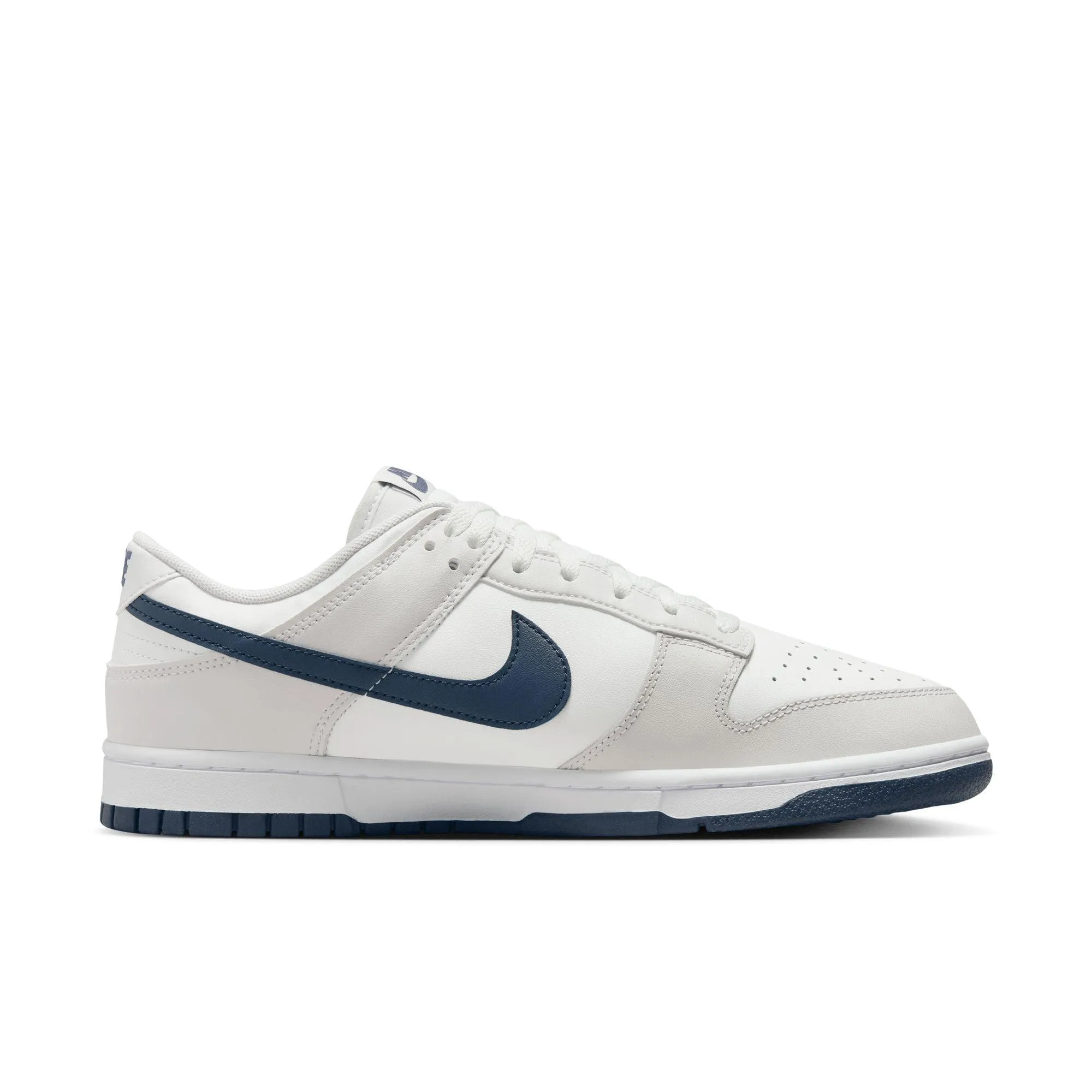 Nike Dunk Low Retro - Summit White/Midnight Navy sold by Stomping Ground