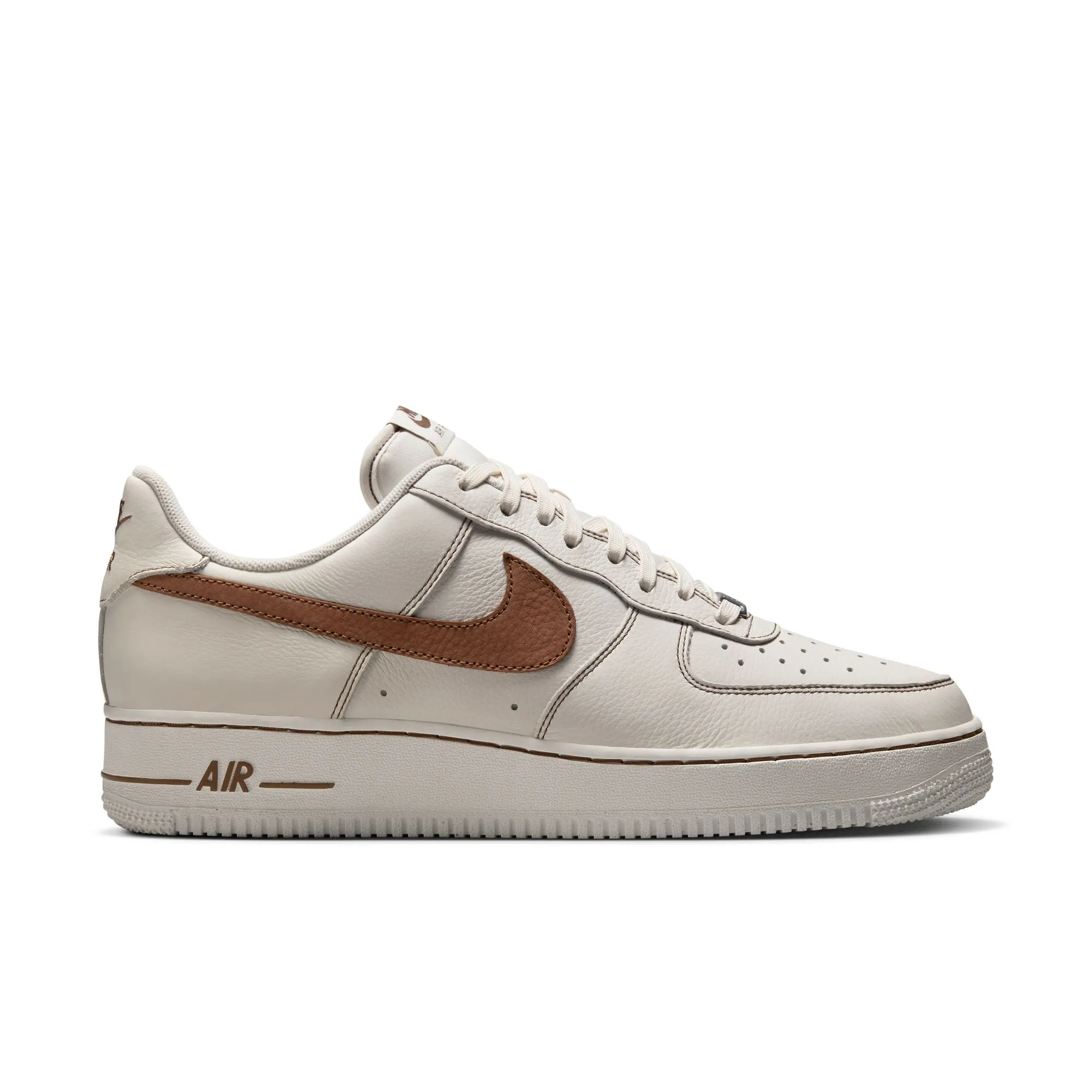 Nike Air Force 1 '07 LV8 - Ivory/Saddle Brown sold by Stomping Ground