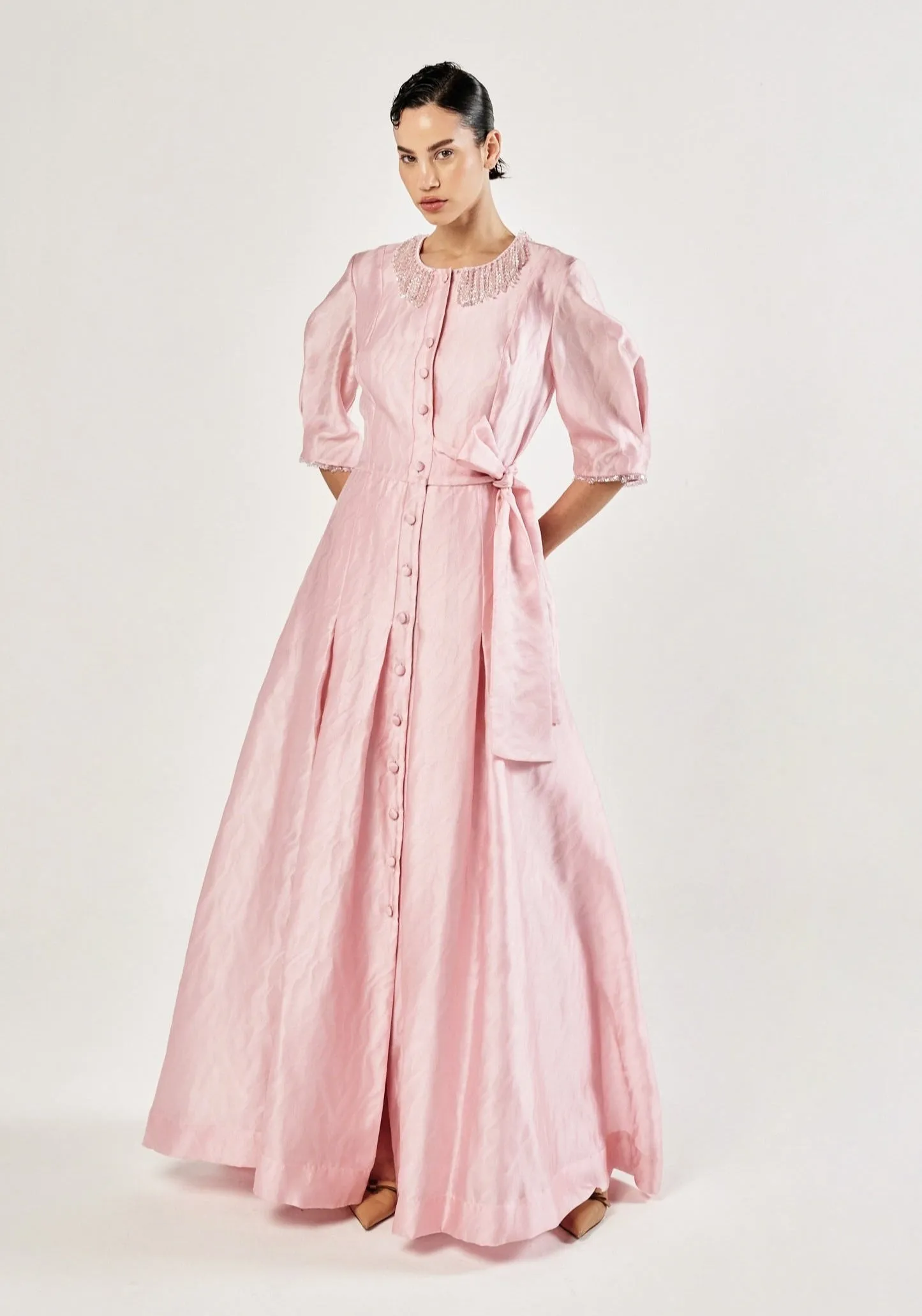 Farrah Gown. sold by Baruni