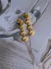 Cascading Shell Drop Earrings sold by Bibi & Kim