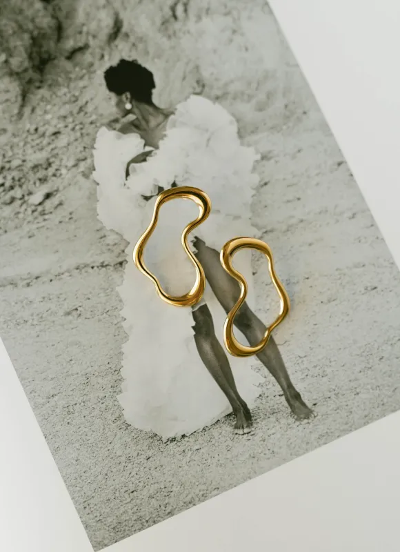Fluid Wave Earrings – Gold sold by Bibi & Kim