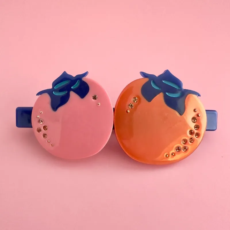 Persimmon Alligator Hair Clip sold by Centinelle