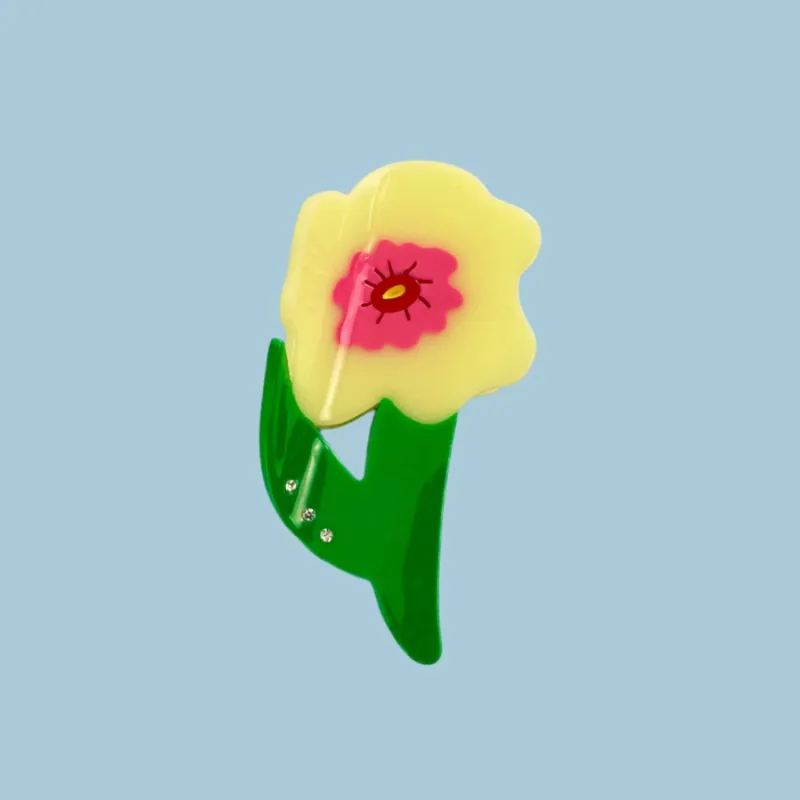 Neon Yellow Flower Hair Claw sold by Centinelle