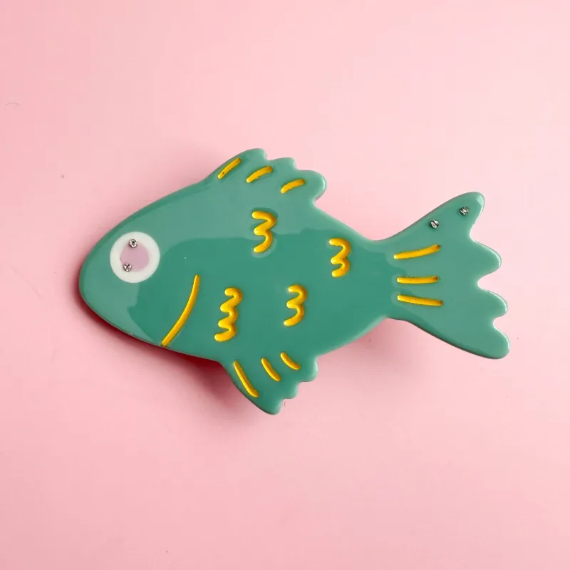 Green Fish Alligator Hair Clip sold by Centinelle