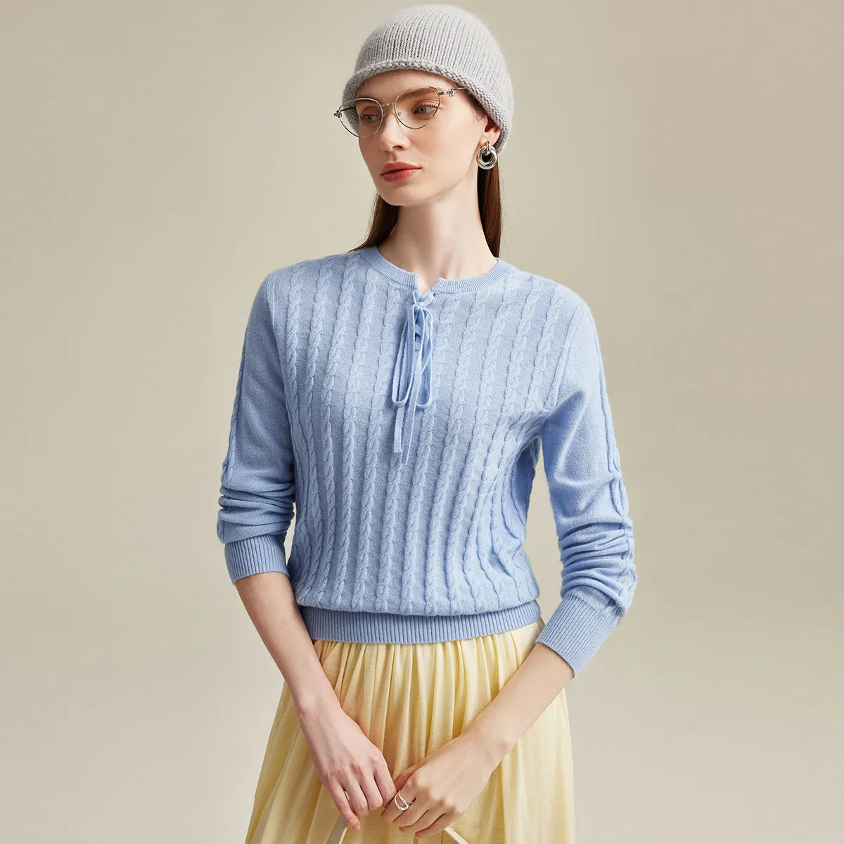 100% Cashmere Cable Knit Sweater with Bow Detail sold by COMOBOCA
