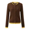 100% Wool Cable Knit Cardigan with Contrast Trim sold by COMOBOCA