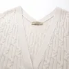 100% Wool Women's Cable Knit Button-Front Vest sold by COMOBOCA