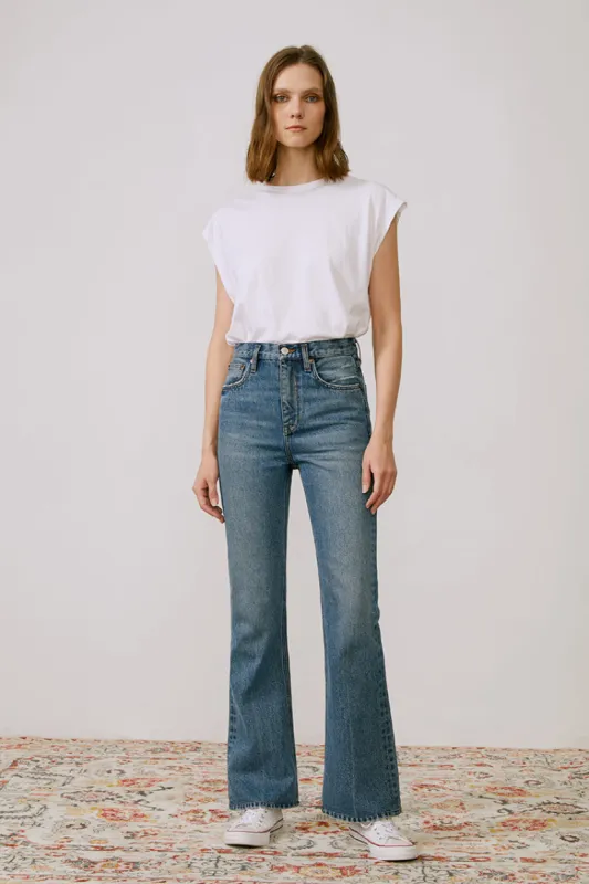The French Song Mid Rise Bootcut Jeans sold by Hey Joanie