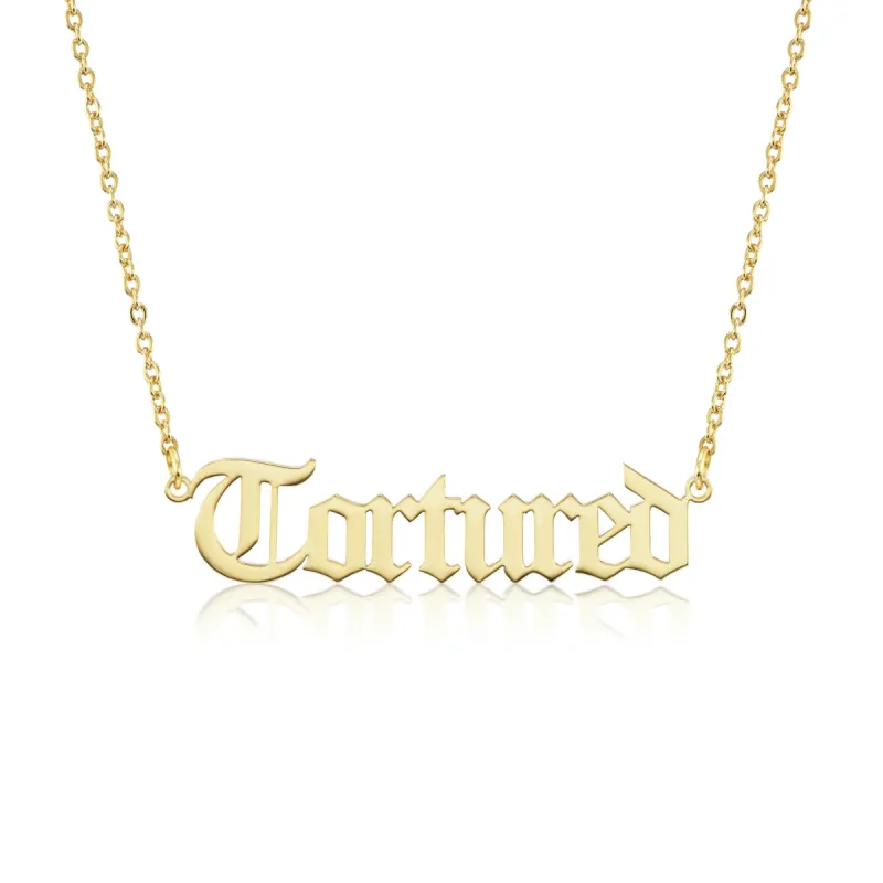 "Tortured" Gothic Nameplate Necklace sold by Mad Fine
