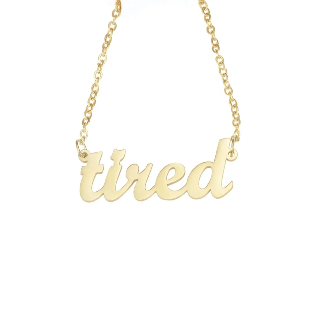 "tired" Script Nameplate Necklace sold by Mad Fine