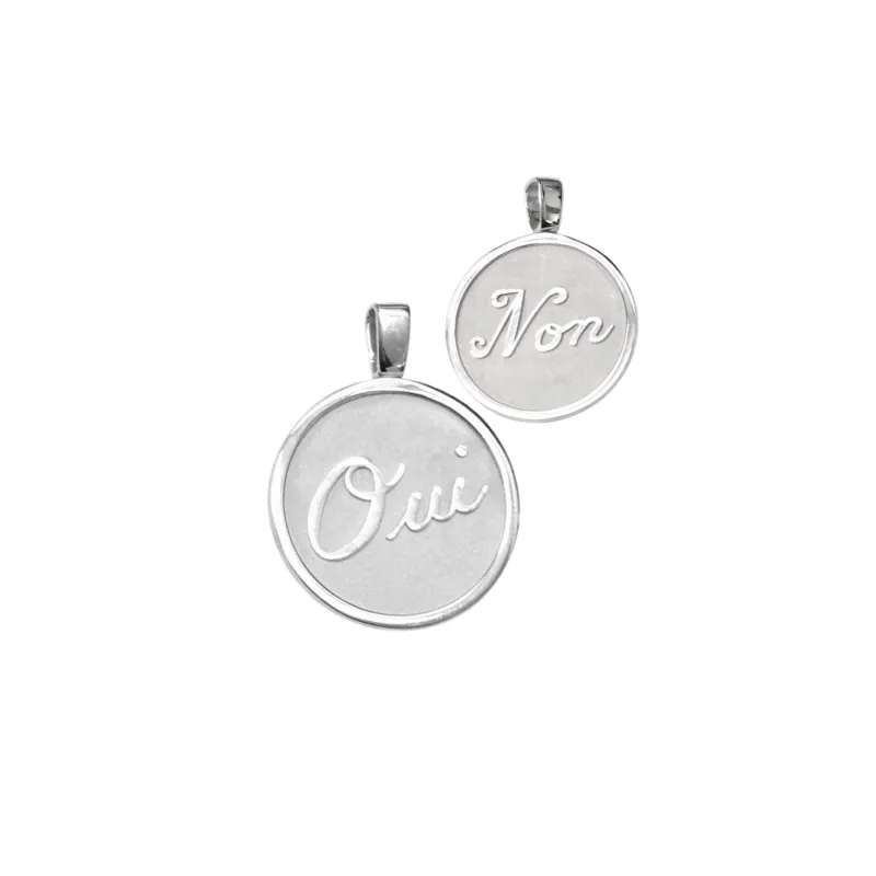 Silver Oui / Non Pendant sold by Mad Fine