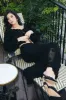 Mohair-blend long skirt with crocheted flowers - black sold by Pheme Paris