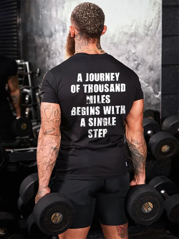 A Journey Of Thousand Miles Begins With A Single Step Printed Men's T-shirt sold by Polyalien