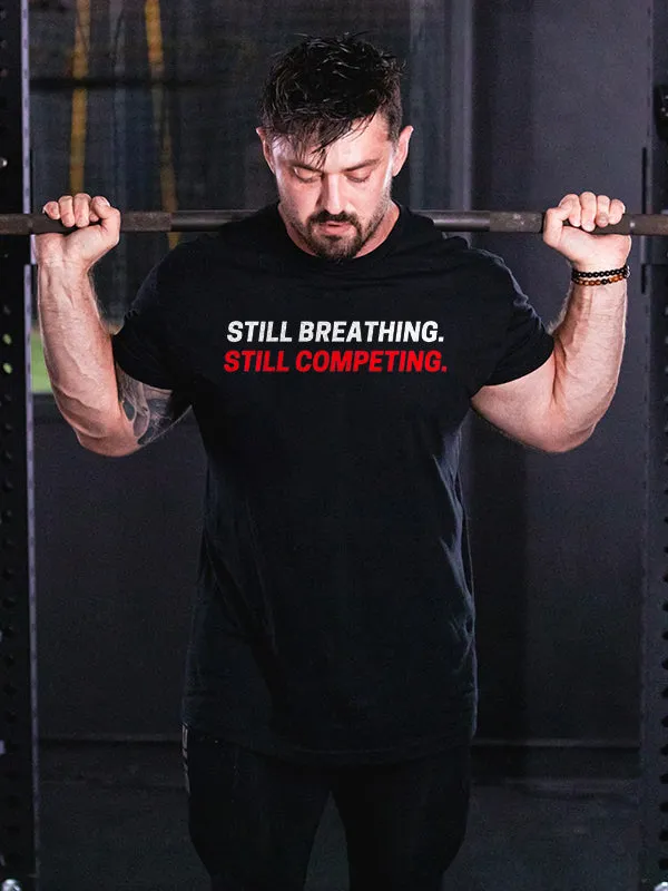 Still Breathing. Still Competing Printed Men's T-shirt sold by Polyalien