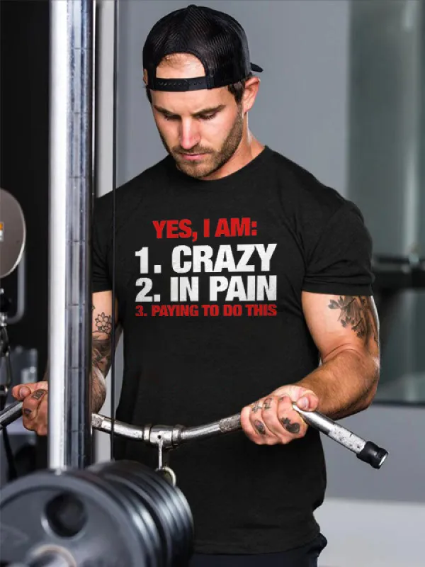 Yes, I Am:1. Crazy 2. In Pain 3. Playing To Do This Printed T-shirt sold by Polyalien