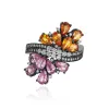 Petite Twin Blossom Ring sold by Veniroeshop