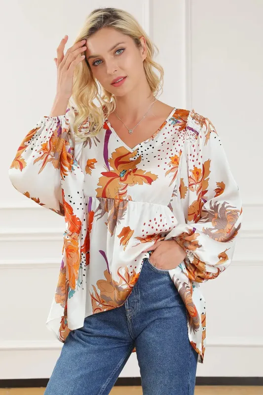 Printed V-Neck Smocked Balloon Sleeve Blouse sold by Gigi Laurent