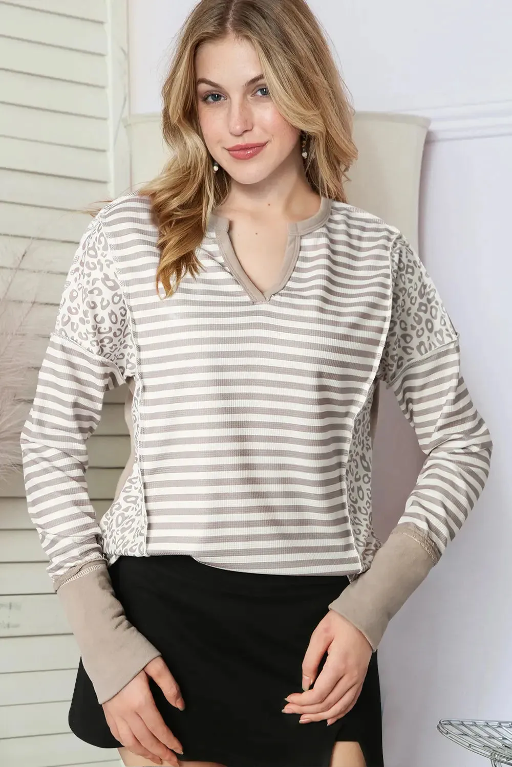 Exposed Seam Striped Notched Blouse sold by Gigi Laurent