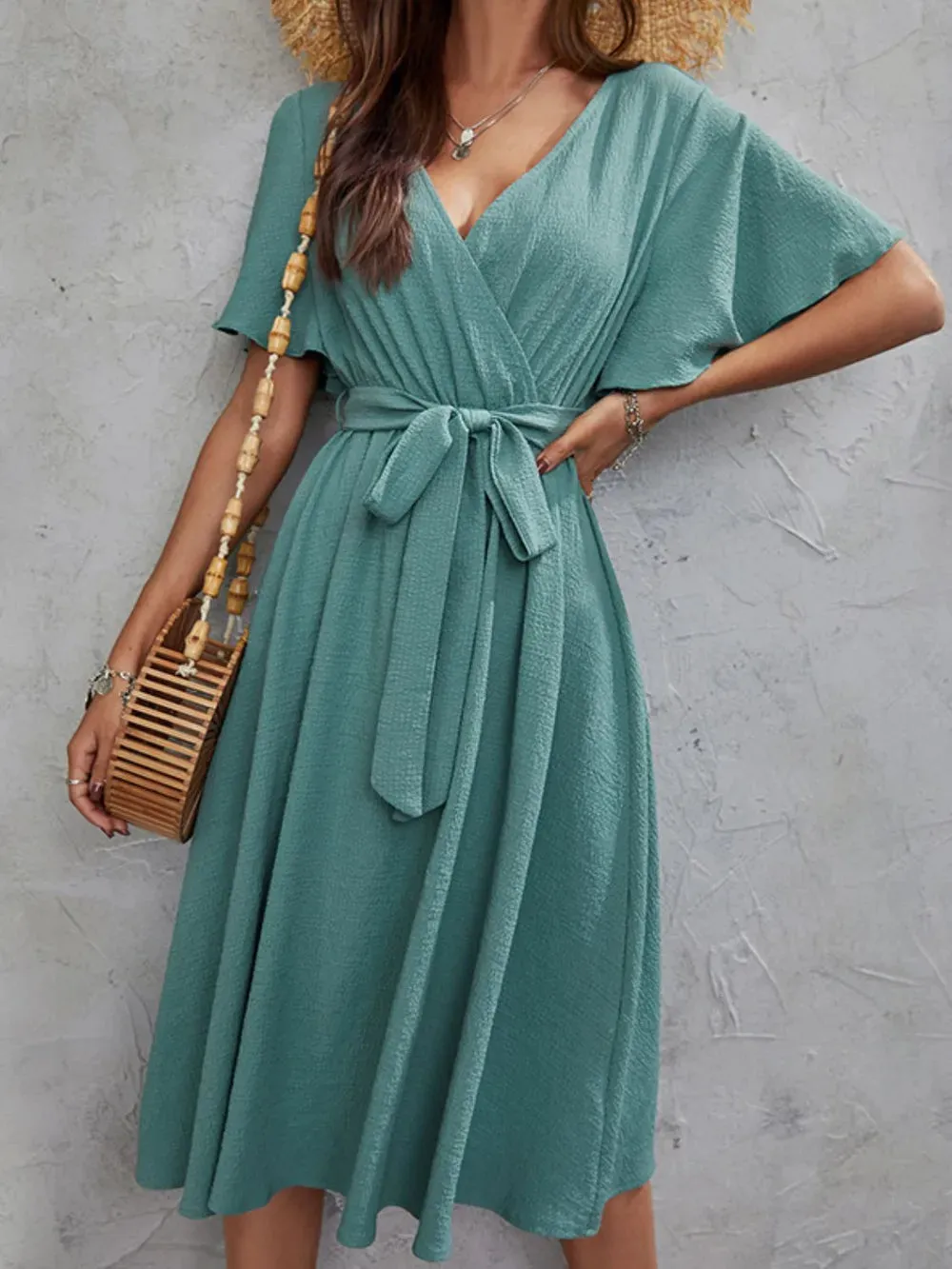 Surplice Flutter Sleeve Midi Dress sold by Gigi Laurent