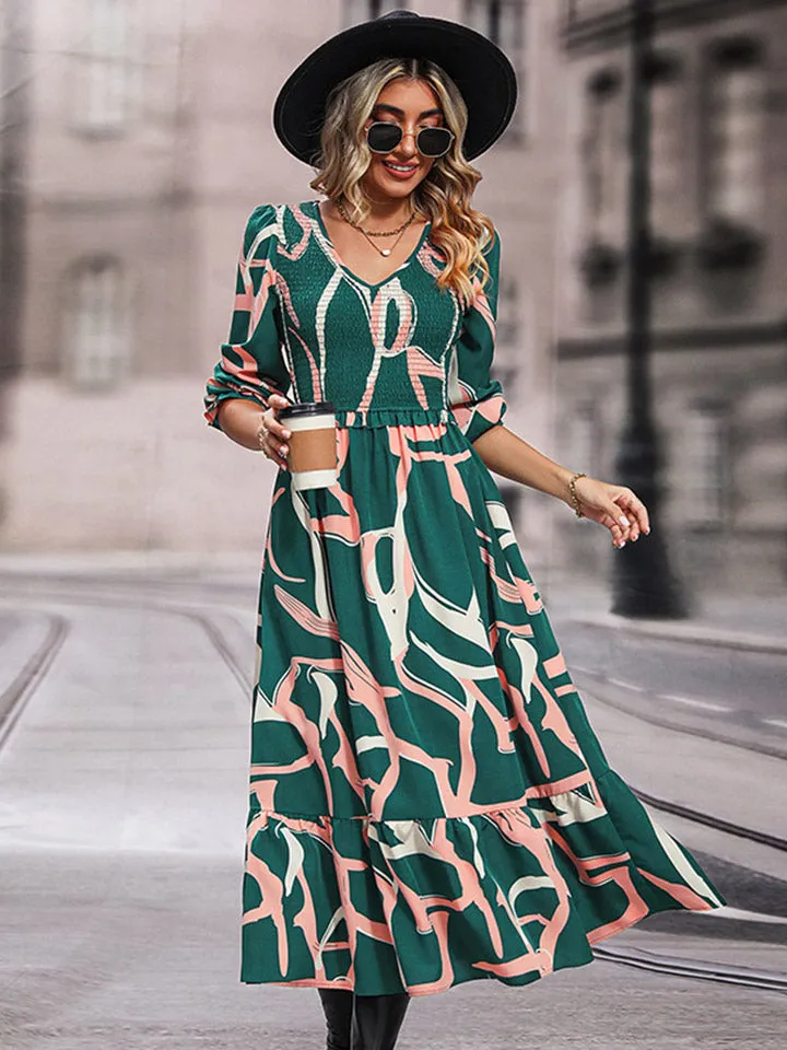 Perfee Printed Smocked V-Neck Three-Quarter Sleeve Midi Dress sold by Gigi Laurent