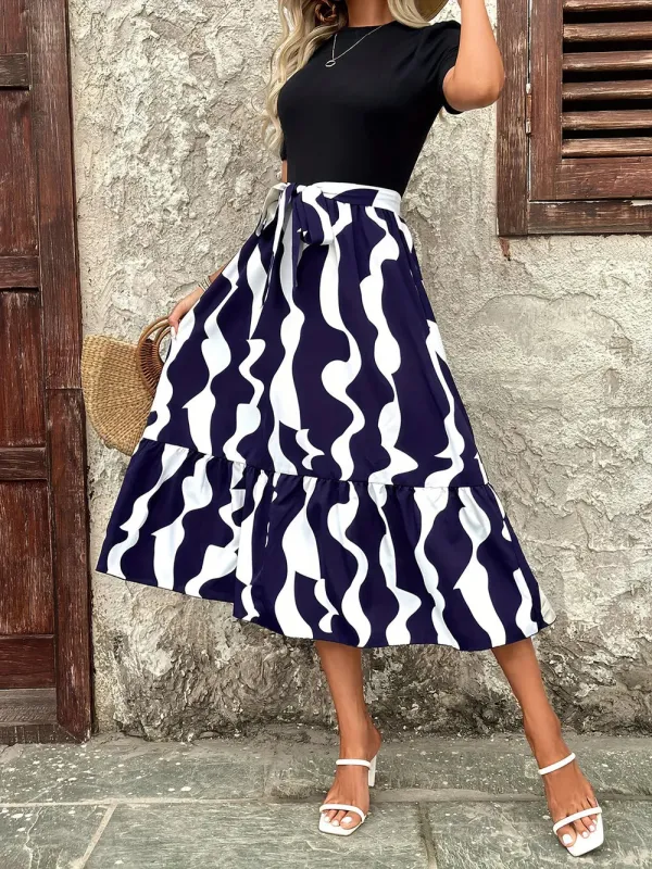 Printed Round Neck Short Sleeve Midi Dress sold by Gigi Laurent