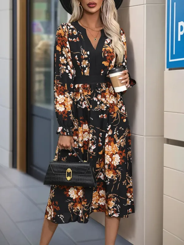 Perfee Printed Notched Long Sleeve Midi Dress sold by Gigi Laurent