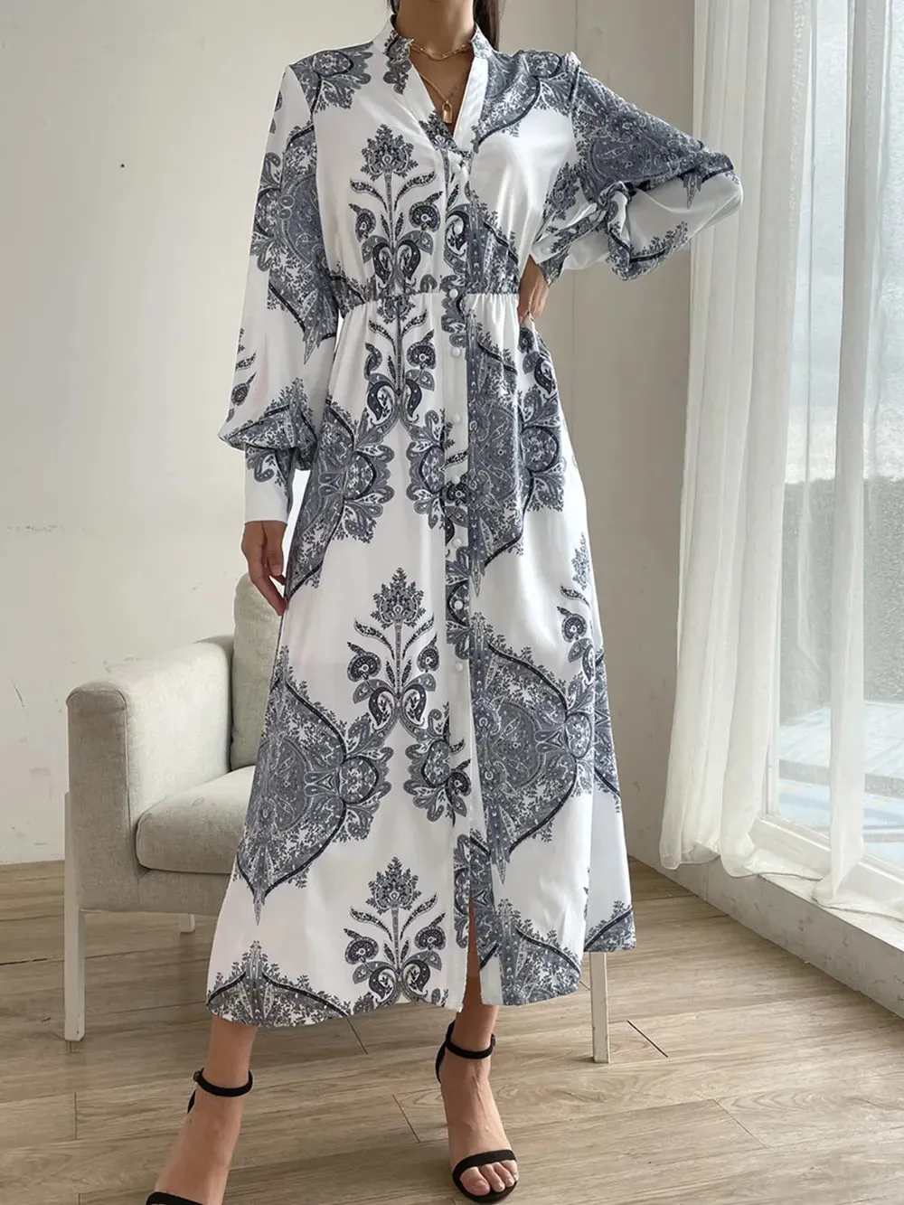 Printed Notched Lantern Sleeve Midi Dress sold by Gigi Laurent