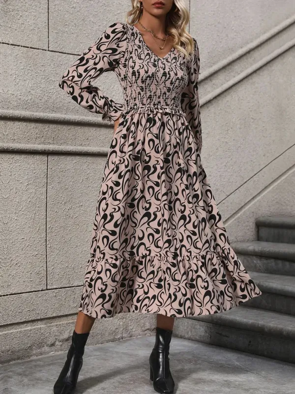 Perfee Printed V-Neck Long Sleeve Midi Dress sold by Gigi Laurent