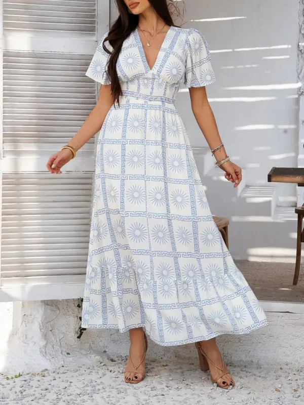 Devine Smocked Printed V-Neck Short Sleeve Maxi Dress sold by Gigi Laurent