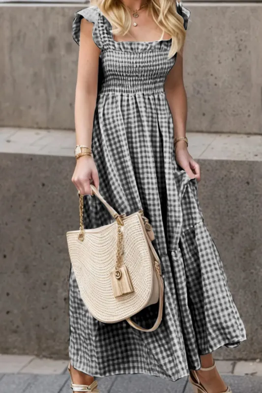 Full Size Smocked Ruffled Plaid Ruffle Hem Dress sold by Gigi Laurent