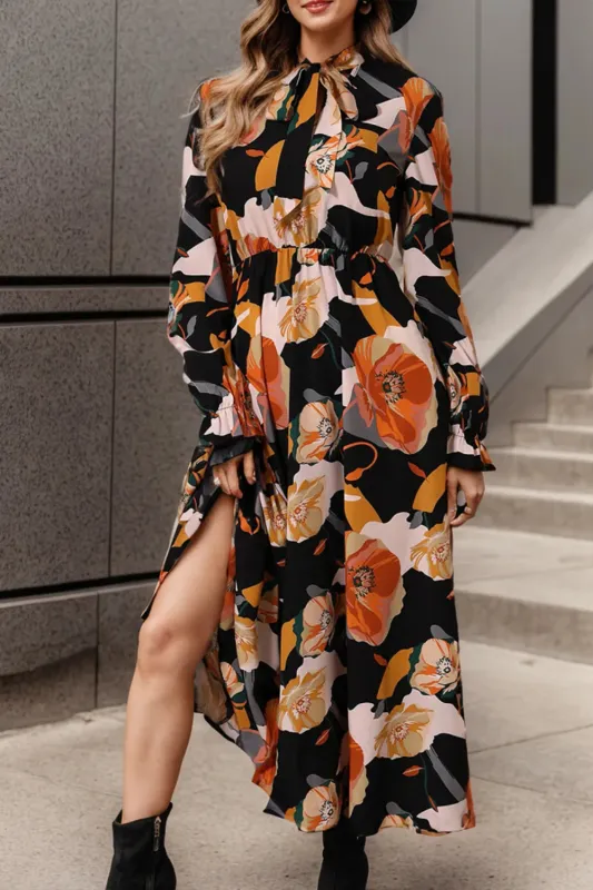 Printed Tie Neck Flounce Sleeve Dress sold by Gigi Laurent
