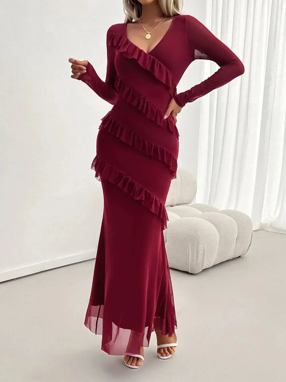 Devine Ruffled Surplice Long Sleeve Maxi Dress sold by Gigi Laurent