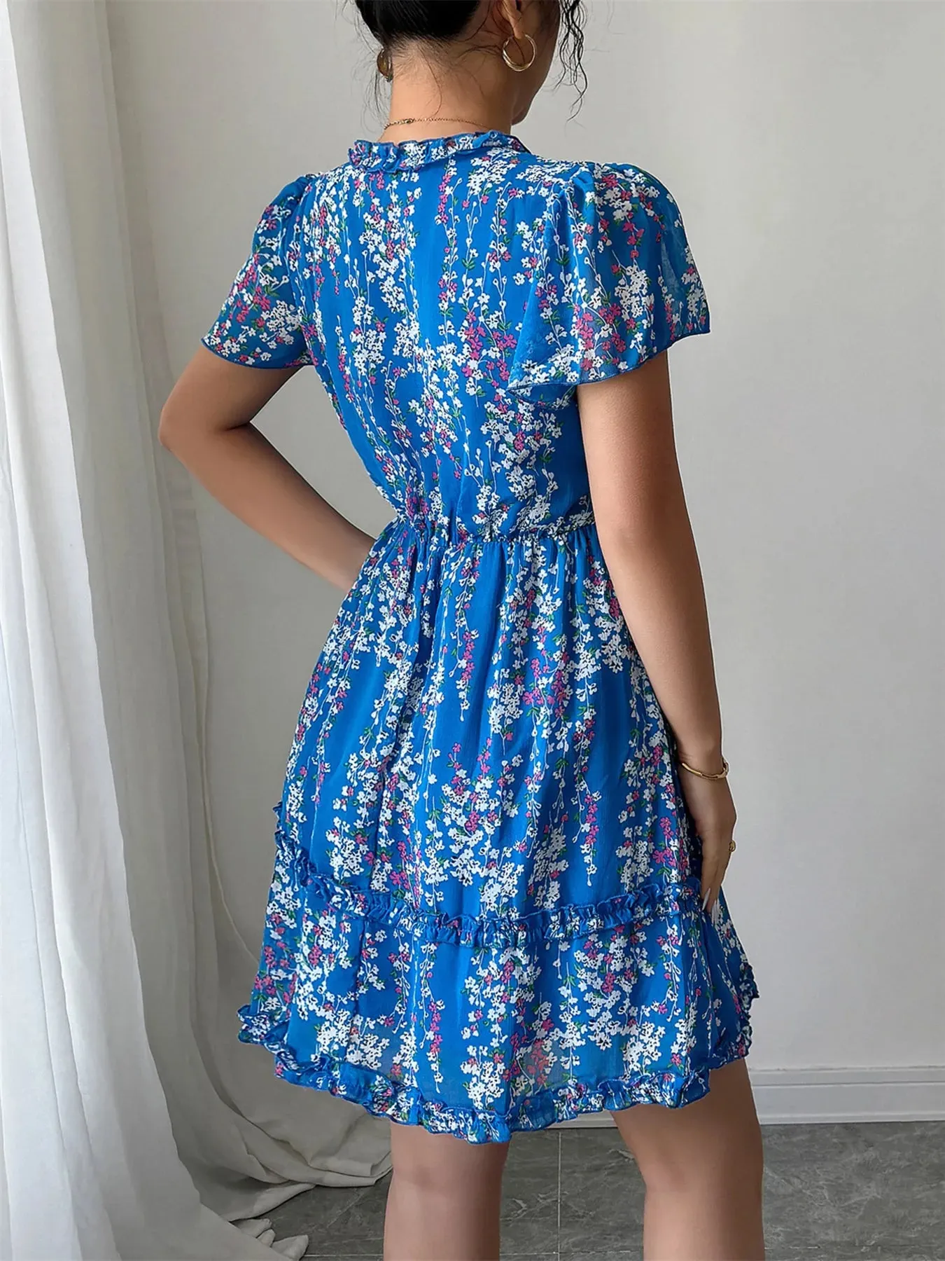 Floral Wrap Dress with Flutter Sleeves sold by Gigi Laurent product image thumbnail 5