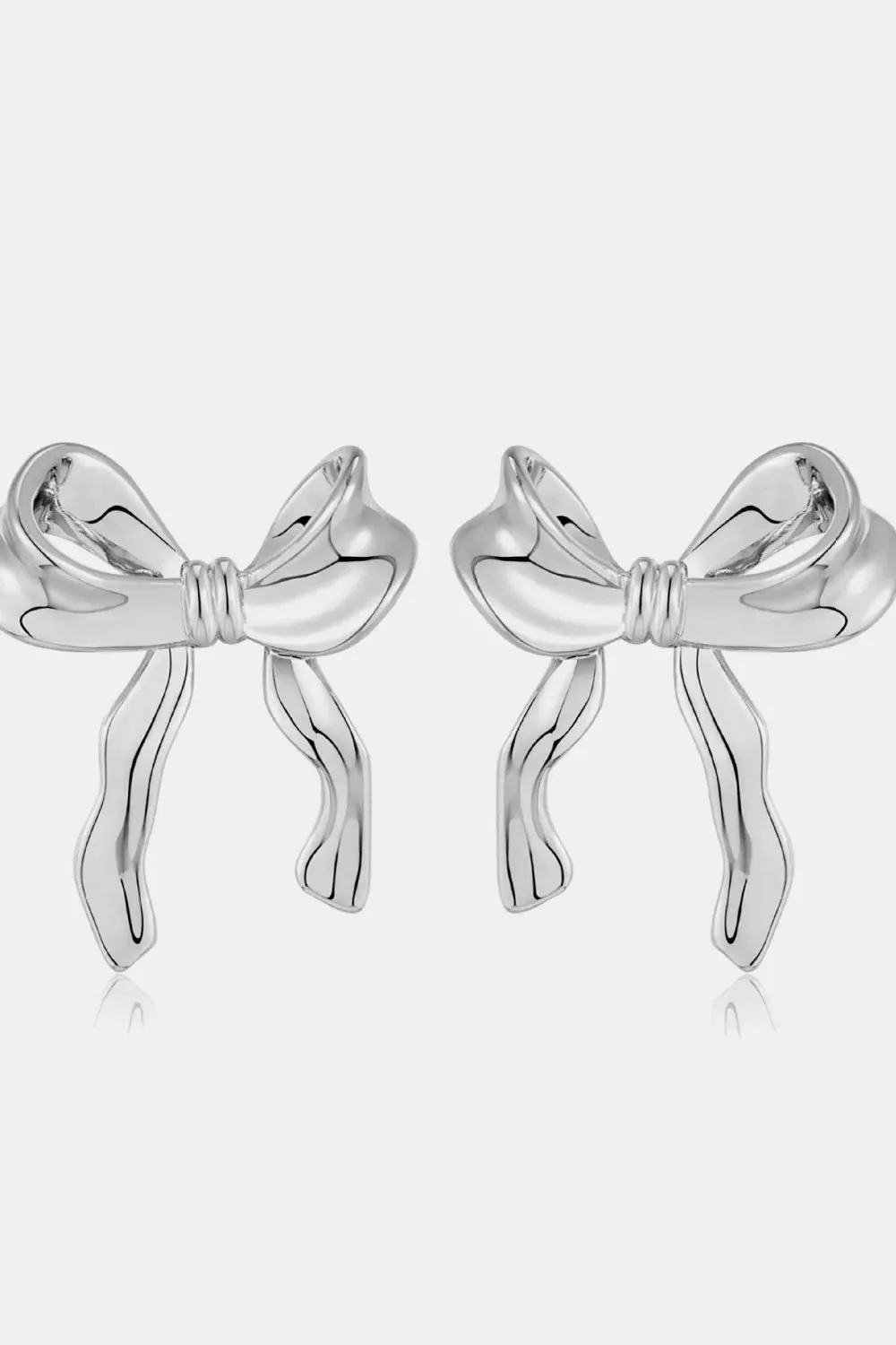 Brass Bow Stud Earrings sold by Gigi Laurent product image thumbnail 4