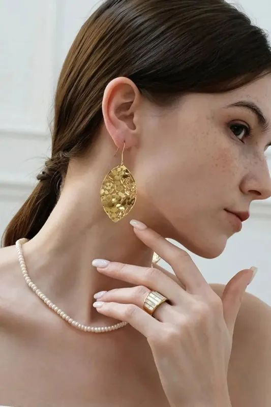 Brass Cutout Leaf Shape Earrings sold by Gigi Laurent