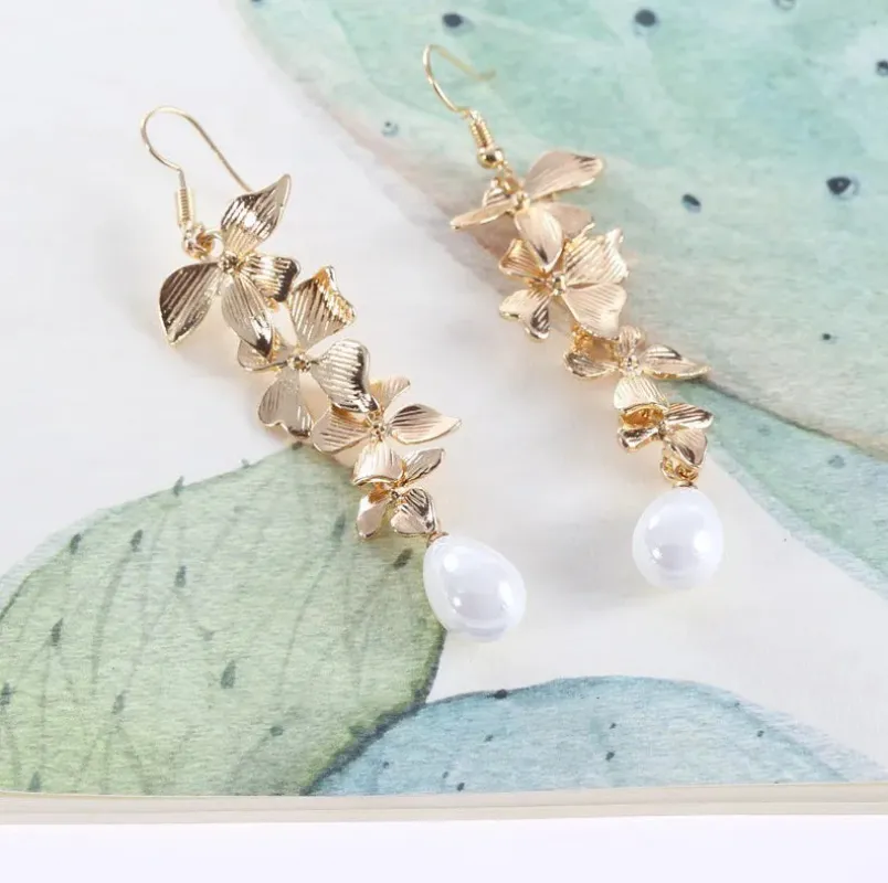 Alloy Flower Synthetic Pearl Earrings sold by Gigi Laurent